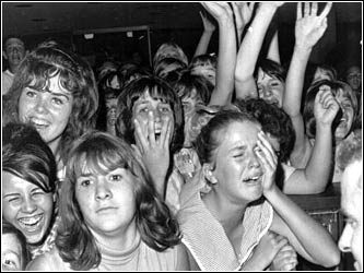 Fans reacting to the Beatles